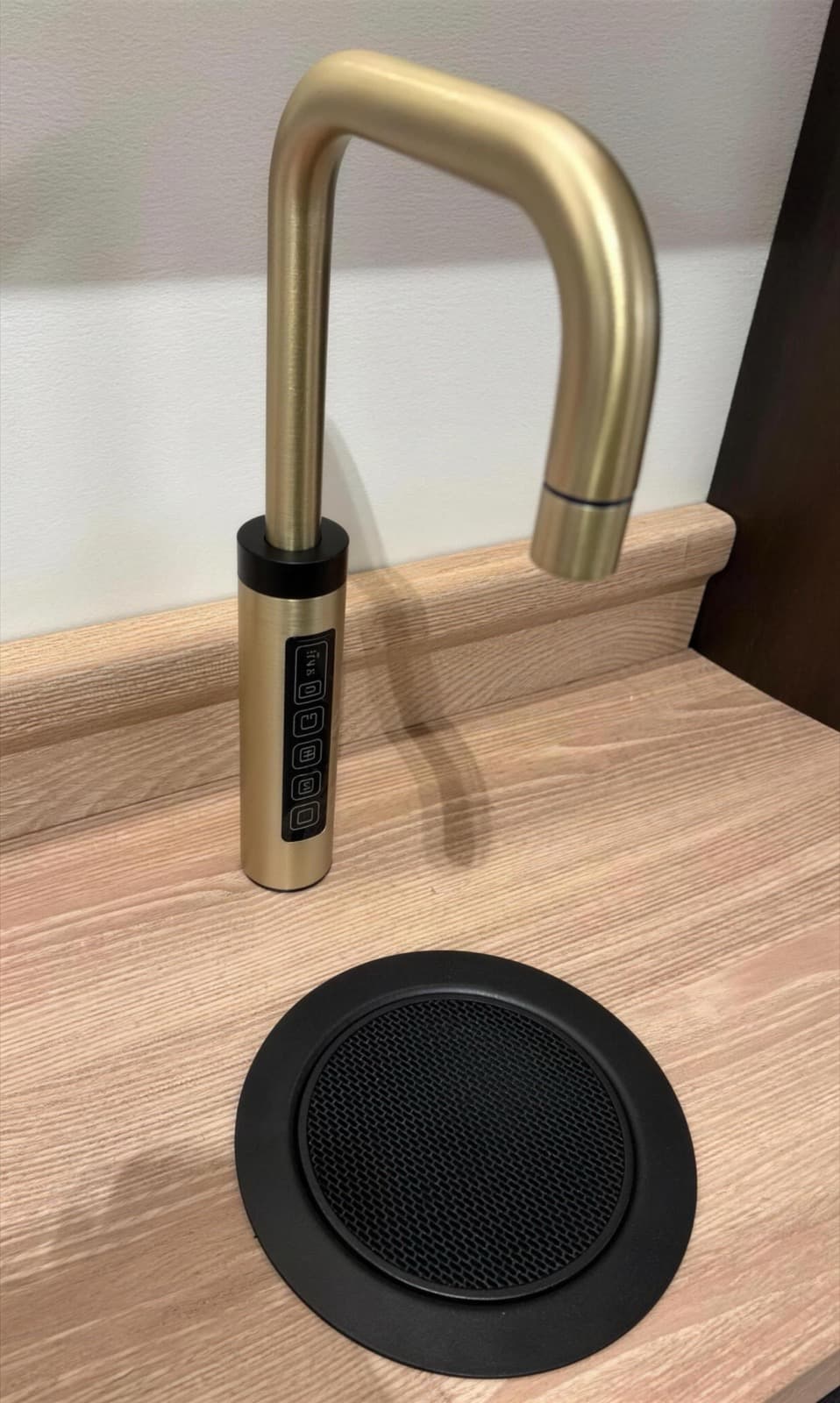 RoyalFlow tap in brushed gold on a timber worktop